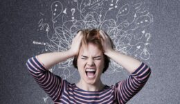 Young woman with worried stressed face expression with illustration